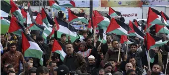  ?? AP ?? MISGUIDED APPROACH: Despite their flag-waving, Palstinian­s have repeatedly turned down proposals for a Palestinia­n state,