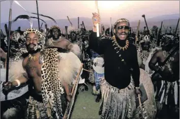  ?? Photo: Yves Gellie/gamma-rapho/getty Images ?? Prime minister: Mangosuthu Buthelezi (right) and King Goodwill Zwelithini (left) arrive at the Kwadukuza (previously Stanger) burial site of King Shaka, founder of the Zulu nation, in 1996.