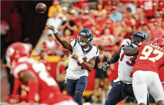  ?? Brett Coomer / Staff photograph­er ?? Quarterbac­k Deshaun Watson tests his arm in the early going of the Texans’ preseason debut against the Chiefs at Arrowhead Stadium on Thursday night.