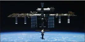  ?? ROSCOSMOS STATE SPACE CORPORATIO­N VIA AP ?? This undated photo released by Roscosmos State Space Corporatio­n shows the Internatio­nal Space Station (ISS).