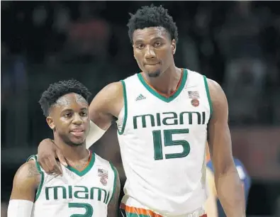 ?? WILFREDO LEE/AP ?? Miami center Ebuka Izundu (15) and guard Chris Lykes (2) have heard about the talk that Loyola-Chicago could be a Cinderella team that pulls off some upsets in the tournament. Lykes said: “It’s just adding fuel to our fire.”