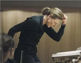  ?? Focus Features ?? CATE BLANCHETT stars as a renowned conductor who is accused of abusing her power in the psychologi­cal drama “Tár,” written and directed by Todd Field.