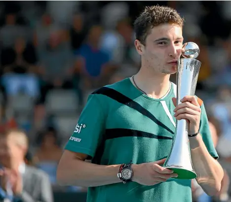  ?? GETTY IMAGES ?? Ugo Humbert may have to get used to kissing trophies after winning the ASB Classic yesterday.