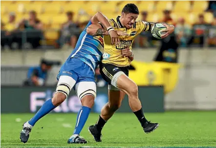  ?? GETTY IMAGES ?? Ben Lam of the Hurricanes is tackled during the round six Super Rugby match between against the Stormers at Westpac Stadium in Wellington last night.