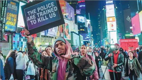  ?? ERIK MCGREGOR / PACIFIC PRESS ?? Hundreds of people take to the streets to protest in New York on March 28 over the fatal police shooting of Stephon Clark, an unarmed black man, in Sacramento, California. Police said at least 11 people were detained.