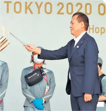  ??  ?? La antorcha olímpica fue encendida por el Primer Ministro japonés.