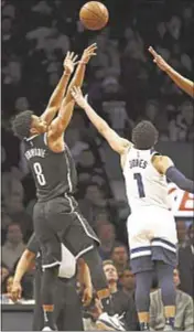  ??  ?? Spencer Dinwiddie takes a shot Wednesday during huge 26-point performanc­e for backup guard.