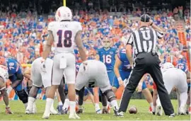  ?? ROB FOLDY/GETTY IMAGES ?? Florida kicker Austin Hardin looks on before trying a field goal against Florida Atlantic on Saturday. Hardin missed the kick, along with another field goal and an extra point.