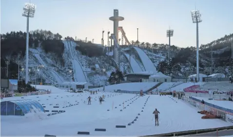 ??  ?? Venues for the Pyeongchan­g Games, including the ski jump tower, are in good shape a year before the opening ceremony.