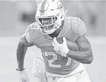  ?? JOHN MCCALL/SUN SENTINEL ?? Dolphins head coach Brian Flores on running back Kalen Ballage: “Kalen works extremely hard. He’s done a good job in practice. It hasn’t materializ­ed in games, but I think [if] we just keep giving it to him, it will turn.”