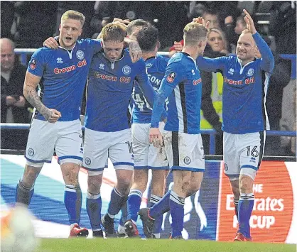  ??  ?? Rochdale players celebrate after scoring against Tottenham at the Crown Oil Arena in Rochdale last Sunday.