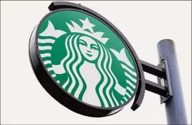  ?? Matt Rourke / Associated Press ?? Seattle coffee giant Starbucks said it decided to close its 130 stores and no longer have a brand presence in Russia.