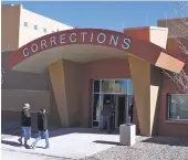  ?? FELICIA FONSECA AP FILE PHOTO ?? Visitors walk up to the newly built adult detention facility in Tuba City, Ariz., in February 2013. The year the jail opened, authoritie­s booked an inmate with tuberculos­is without a proper screening, triggering an outbreak, and dozens of inmates and...