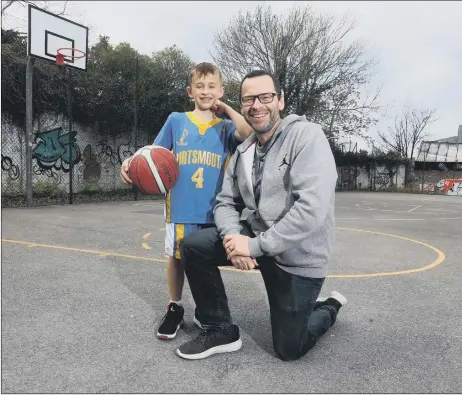  ??  ?? SLAM DUNK Zach Robinson with his dad, Gary. Zach is aiming to raise more than £500 for a new basketball court in the city