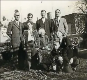  ?? PHOTO COURTESY OF TERRI WALKER ?? This photo was probably taken June 30, 1934, at a party to celebrate the 81st birthday of Malinda Binder, Billy’s mother, which Billy couldn’t attend. The event was held at the home of George L. Binder, fourth man from the left standing, at 374 N. Hanover St. George Binder worked as a type setter for the Pottstown Mercury from its founding until his retirement in 1959. He began his career with the Pottstown Daily Ledger in 1900.