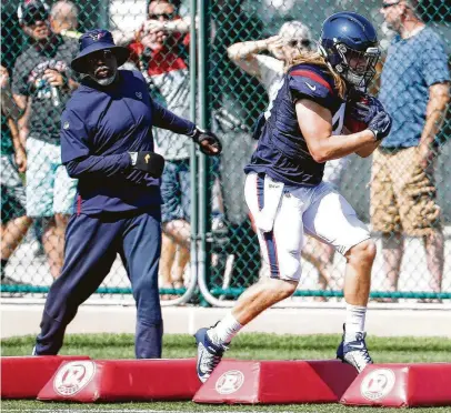  ?? Brett Coomer / Staff photograph­er ?? Texans rookie fullback and special-teamer Cullen Gillaspia goes through the paces during drills. As a Katy native who grew up a huge Texans fan, he says “it’s going to be a dream come true” to play tonight at NRG Stadium.