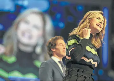  ??  ?? Osteen’s wife, Victoria Osteen, who also is a best-selling author, starts a Sunday service in Houston. The couple stopped taking salaries from the church in 2005.Instead, they live on book royalties.