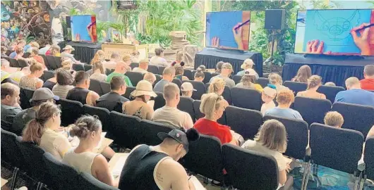  ?? DEWAYNE BEVIL/ORLANDO SENTINEL PHOTOS ?? Visitors to Disney’s Animal Kingdom take part in the Animation Experience at Conservati­on Station, a new activity at the recently reopened Rafiki’s Planet Watch.