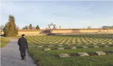  ??  ?? JEREMY CORBYN, head of the British Labour Party, tours the Theresiens­tadt concentrat­ion camp north of Prague on Saturday.