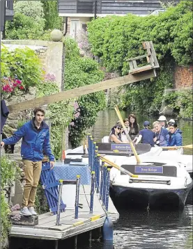  ??  ?? The ducking stool on the River Stour in Canterbury city centre