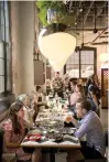  ?? (Monica Herndon/The Philadelph­ia Inquirer/TNS) ?? Diners enjoy a meal at Laser Wolf in Philadelph­ia.