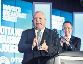  ?? JUSTIN TANG THE CANADIAN PRESS FILE PHOTO ?? Premier Doug Ford is spending billions on a vote-buying subsidy for Ontarians’ monthly electricit­y bill, Martin Regg Cohn writes, but there doesn’t seem to be any money for health care or education.