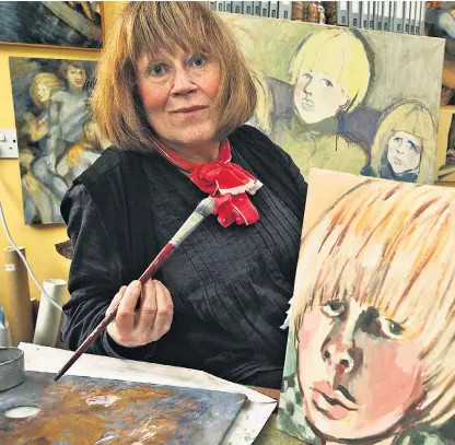  ??  ?? Charlotte Johnson Wahl with a painting of her son Boris as a child