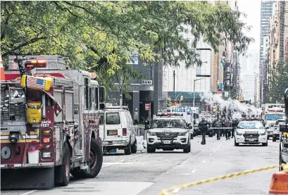  ?? JEENAH MOON THE NEW YORK TIMES ?? The CNN offices in New York were evacuated after an explosive device was sent there Wednesday.