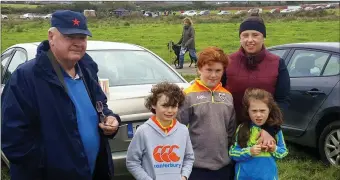  ??  ?? Relaxing during an interval at Kilflynn coursing on Sunday were Andrew Sheehy,Ben Lynch and Deirdre Lynch with son Cillian and daughter Nora Kate.Photo Moss Joe Browne.