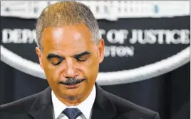  ?? J. SCOTT APPLEWHITE/ THE ASSOCIATED PRESS ?? Attorney General Eric Holder expresses disappoint­ment in the Supreme Court’s 5-4 ruling Tuesday that invalidate­d a provision of the 1965 Voting Rights Act.