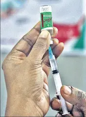  ?? SAMIR JANA /HT ?? A nurse draws a Covishield vaccine shot at an urban primary health centre in Kolkata.