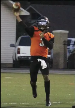  ?? Photo by Alexis Meeks ?? Malvern quarterbac­k Cedric Simmons throws a pass during a recent Leopards’ game. Simmons has passed for 1,886 yards and 15 touchdowns this season and will be heavily relied on for Friday’s game against Trumann.