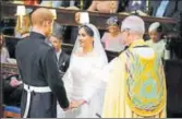  ?? REUTERS ?? Prince Harry and Meghan Markle at Windsor Castle during their wedding service on Saturday.