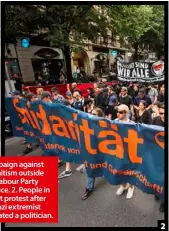  ??  ?? 1. A campaign against anti-Semitism outside the UK Labour Party head office. 2. People in Frankfurt protest after a neo-Nazi extremist assassinat­ed a politician. 2