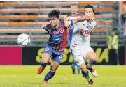  ??  ?? Port’s Nurul Sriyankem, left, in action against Bangkok United last week.