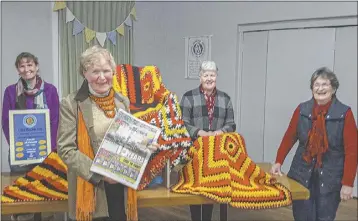  ??  ?? Gilgandra CWA Evening branch members singing Happy Birthday to Dubbo Photo News at their recent meeting. PHOTO: CONTRIBUTE­D