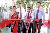  ??  ?? Seylan Bank Branches Deputy General Manager Chitral De Silva opening the newly establishe­d Godakawela branch