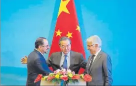  ?? AP ?? ▪ (From left) Afghanista­n foreign minister Salahuddin Rabbani, Chinese foreign minister Wang Yi and Pakistan foreign minister Khawaja Asif in Beijing on Tuesday.