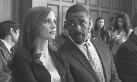  ?? MICHAEL GIBSON/STXFILMS, TNS ?? Jessica Chastain and Idris Elba star in "Molly’s Game."
