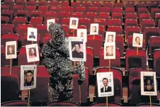  ?? /HENRY NICHOLLS/REUTERS ?? A Cirque du Soleil cast member displays a place stick for a guest during preparatio­ns for the British Academy of Film and Television Awards (Baftas) ceremony at the Royal Opera House in central London, UK.