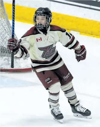  ?? CLIFFORD SKARSTEDT/EXAMINER ?? Peterborou­gh McBain Quarries Minor Atom Petes' Ethan Richardson celebrates his goal scored on Leaside Flames goalie James Pun during the Chris Fee Cup opening ceremonies game at the 60th Peterborou­gh Liftlock Atom Hockey Tournament in the atom BB...