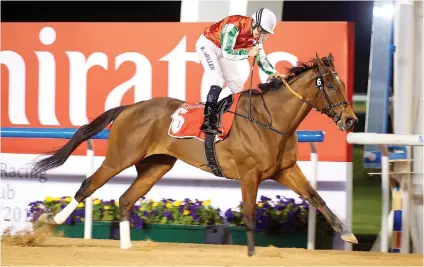  ?? Picture: Dubai Racing Club, Andrew Watkins. ?? WORLD CUP TRIAL: North America and jockey Richard Mullen win the Group 1 Al Maktoum Challenge Round 3 at Meydan to book their place in the Dubai World Cup final field.