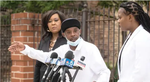  ?? ASHLEE REZIN GARCIA/SUN-TIMES ?? Lawrence Madden Jr., flanked by his two attorneys, talks Tuesday about being attacked by two CTA bus drivers on June 11.