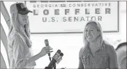  ?? Ap-brynn Anderson ?? Republican congressio­nal candidate Marjorie Taylor Greene (right) introduces Sen. Kelly Loeffler, R-GA., on Thursday.