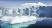  ??  ?? Global climate change is causing a loss of ice in the Arctic as the oceans grow warmer, but an increase in ice in the Antarctic.