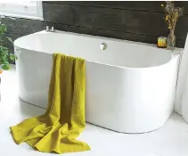  ??  ?? Anticlockw­ise from left: Strait back-to-wall bath from Waters Baths of Ashbourne, from £1,795 (01332 824166; waters baths.co.uk) Mix of Bertie, Mary and Parian tiles by British Ceramic Tiles, from £31 to £78 per square metre (0845 618 7144;...