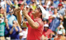  ?? ANDY LYONS / GETTY IMAGES ?? Bryson DeChambeau celebrates after sinking his birdie putt on the third playoff hole to win the Memorial in Dublin, Ohio. DeChambeau three-putted the 18th hole in regulation before salvaging his second career PGA Tour win.