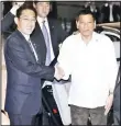  ??  ?? Philippine President Rodrigo Duterte (right), is greeted by Japanese Foreign Minister Fumio Kishida upon his arrival at a Japanese restaurant for dinner in Tokyo on Oct 25. Duterte arrived in Japan earlier in the day for a three-day visit, his first...