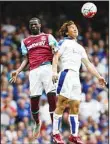  ??  ?? West Ham United’s Spanish midfielder Pedro Obiang (left), jumps for a header with Leicester City’s Japanese striker Shinji Okazaki during the English Premier League football match between West Ham United and Leicester City at The Boleyn Ground...