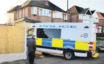  ??  ?? DIG FOR CLUES Forensic team at house linked to suspect John Cannan